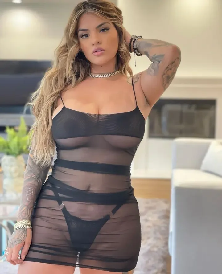 63 hot busty latina in see through dress