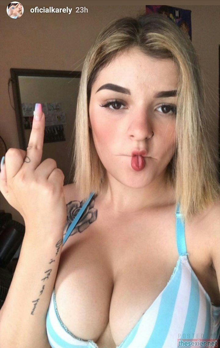 11 hot busty blonde Karely Ruiz showing middle finger hipw2 720x1137