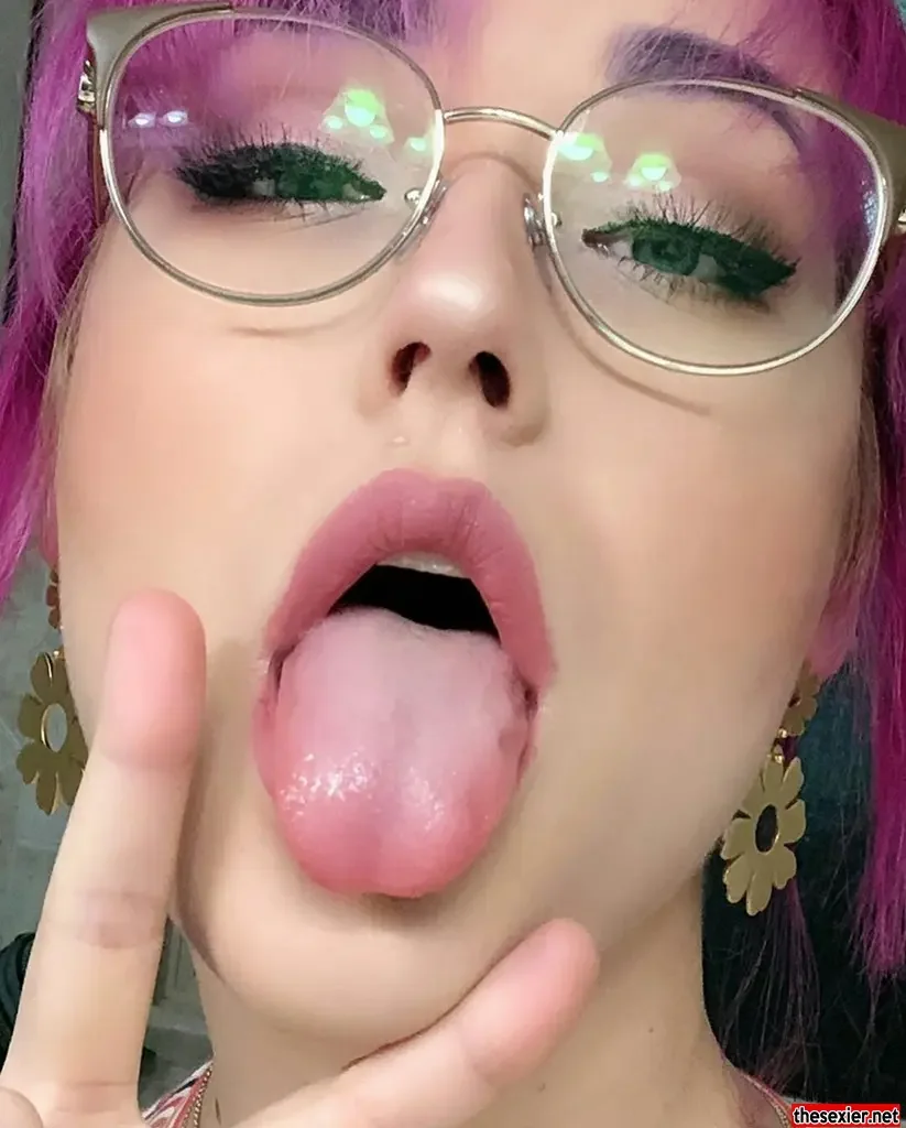 15 purple haired beauty tongue stick out hipw12