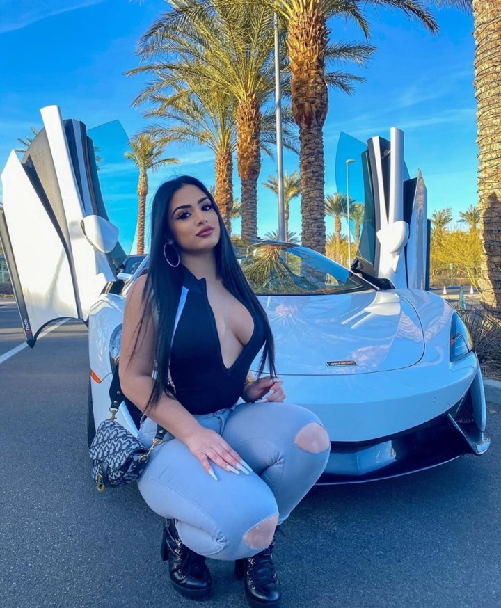 28 gorgeous brunette nadia sexy cleavage and mclaren 570s cgp68 720x874