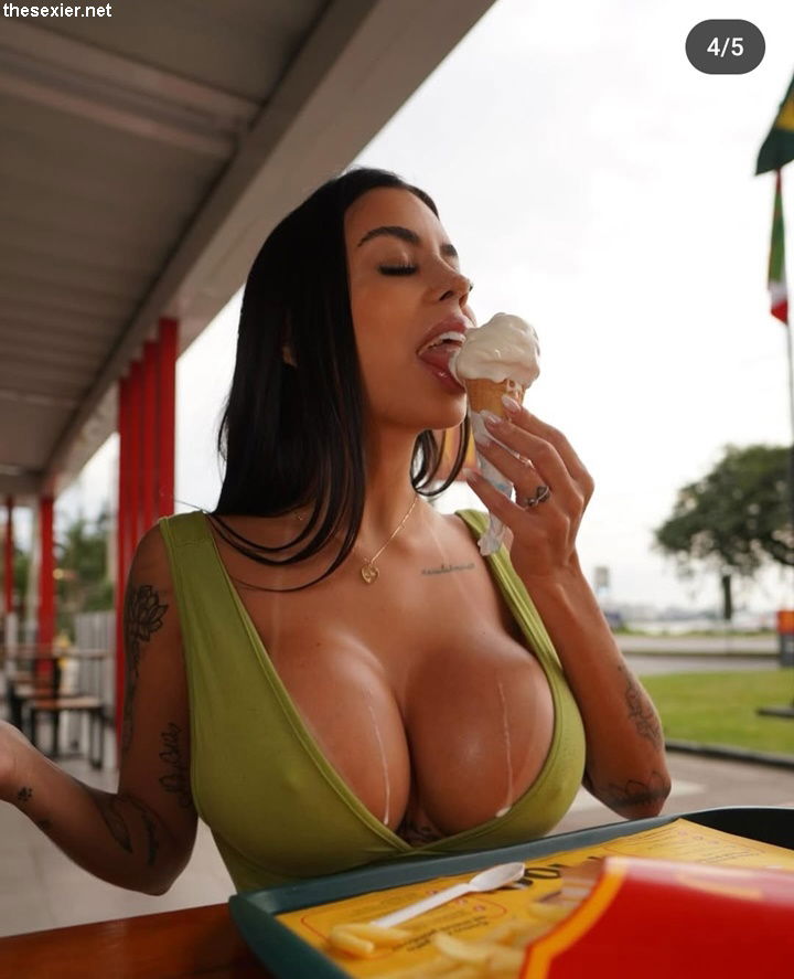 21 hot busty brunette with big cleavage licking icecream hcp49