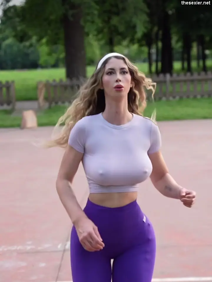 27 hot busty blonde in braless t shirt jogging lwb54